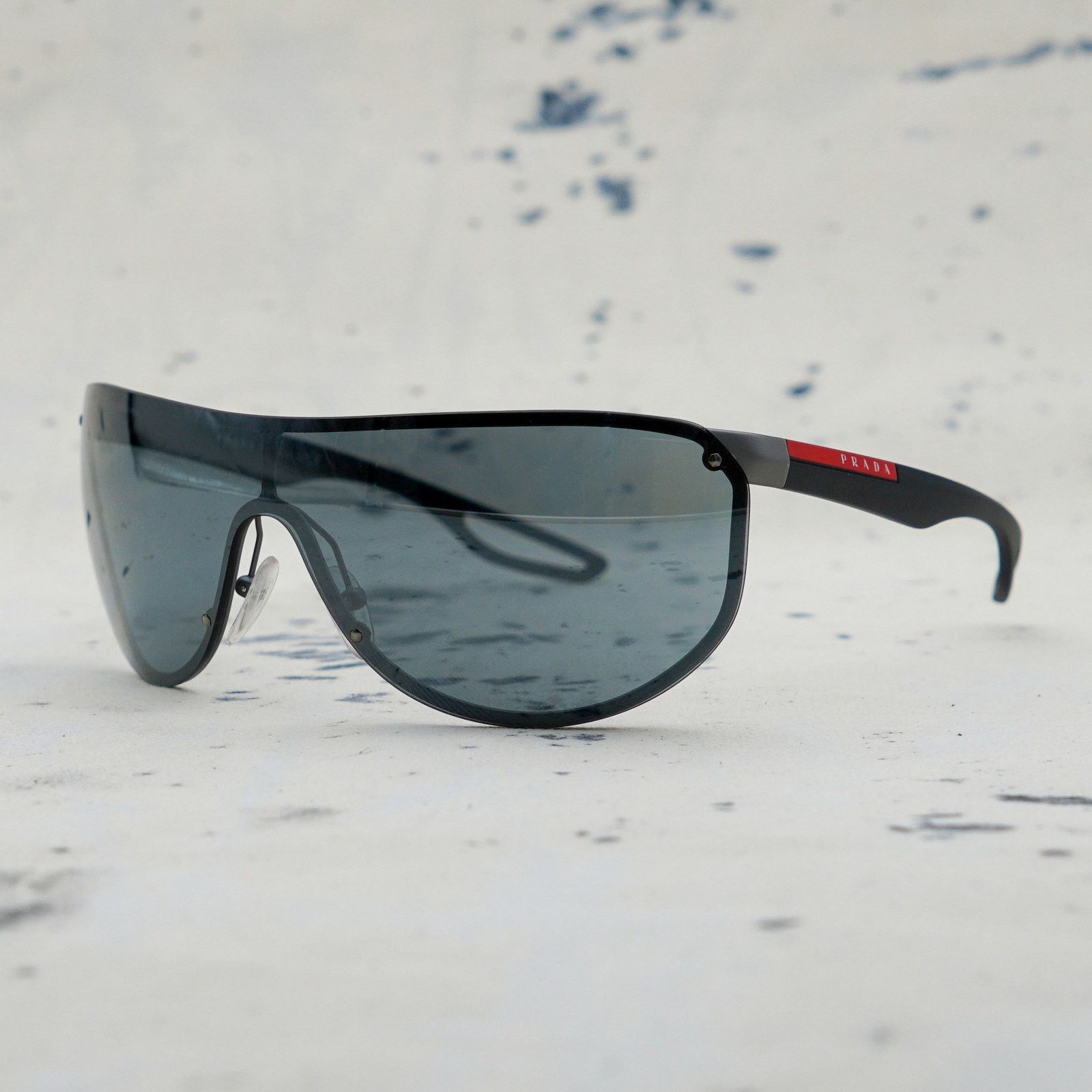 Prada linea rossa sps 61u black wrap shield logo sunglasses