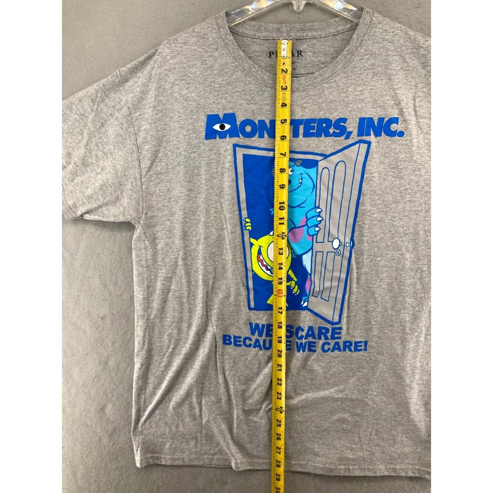 Vintage Disney Pixar Monsters Inc Mens TShirt L Gray We Scare Because We Care Shirt Mens Large Gray Cartoon Movie 90s Theme Boys Girls Mens Size US L / EU 52-54 / 3 - 4 Thumbnail
