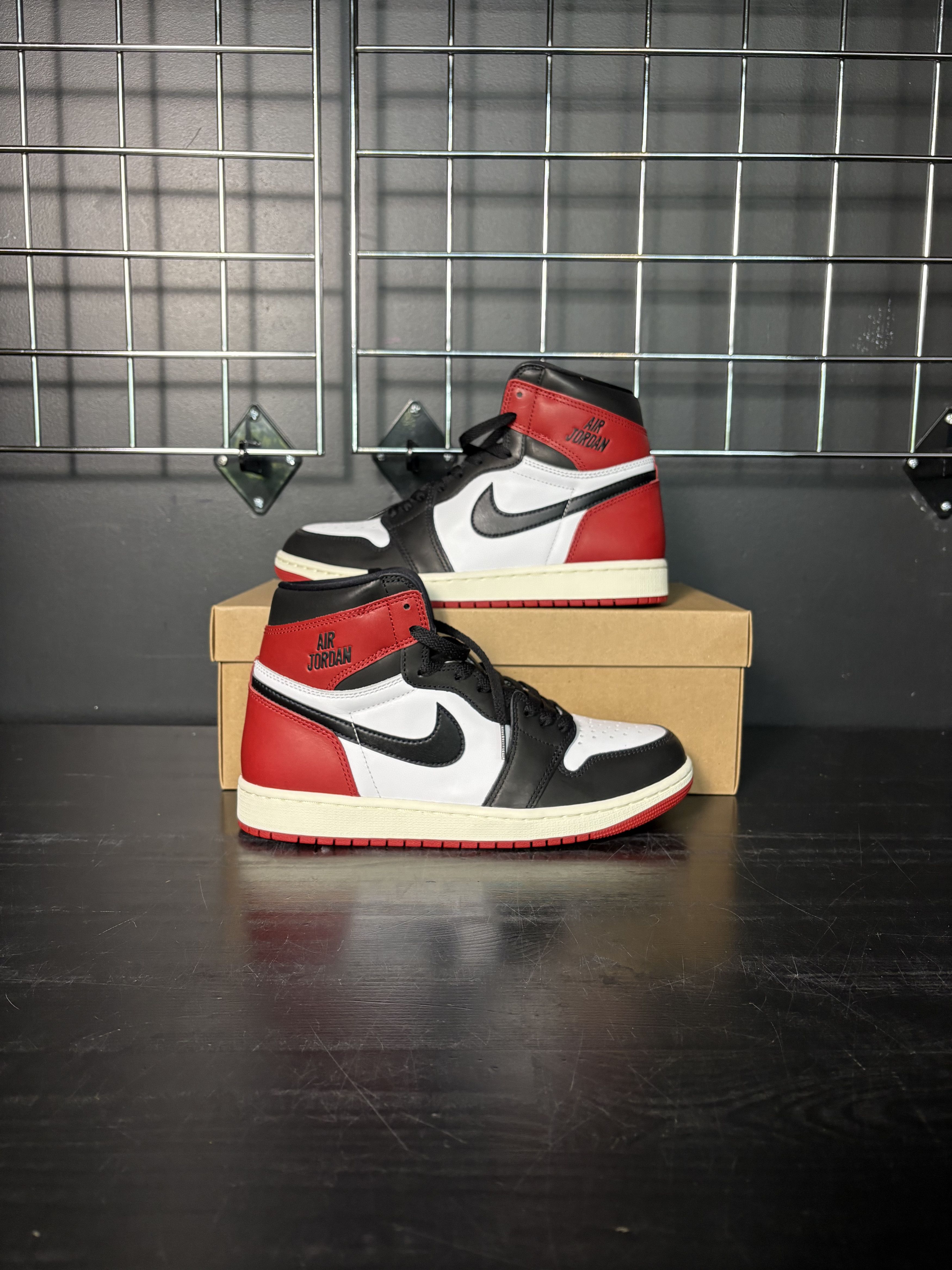 Jordan Brand Air Jordan 1 Retro High OG "Black Toe" Reimagined **PRE-OWNED** Size US 9 / EU 42 - 1 Thumbnail