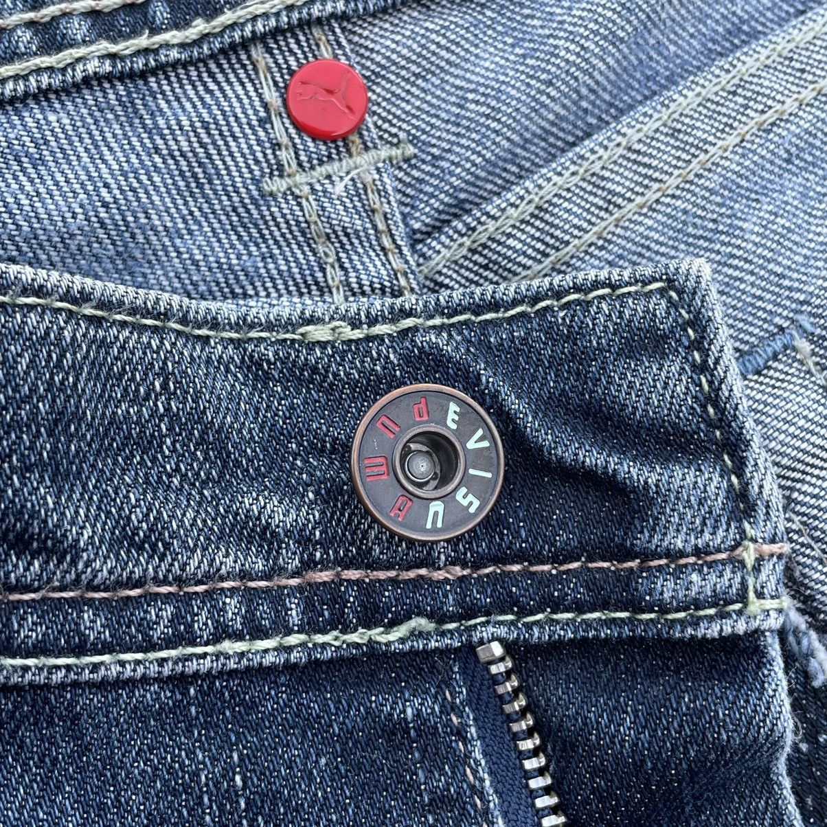 VINTAGE Y2K EVISU X PUMA DISTRESSED WASHED DENIM PANTS