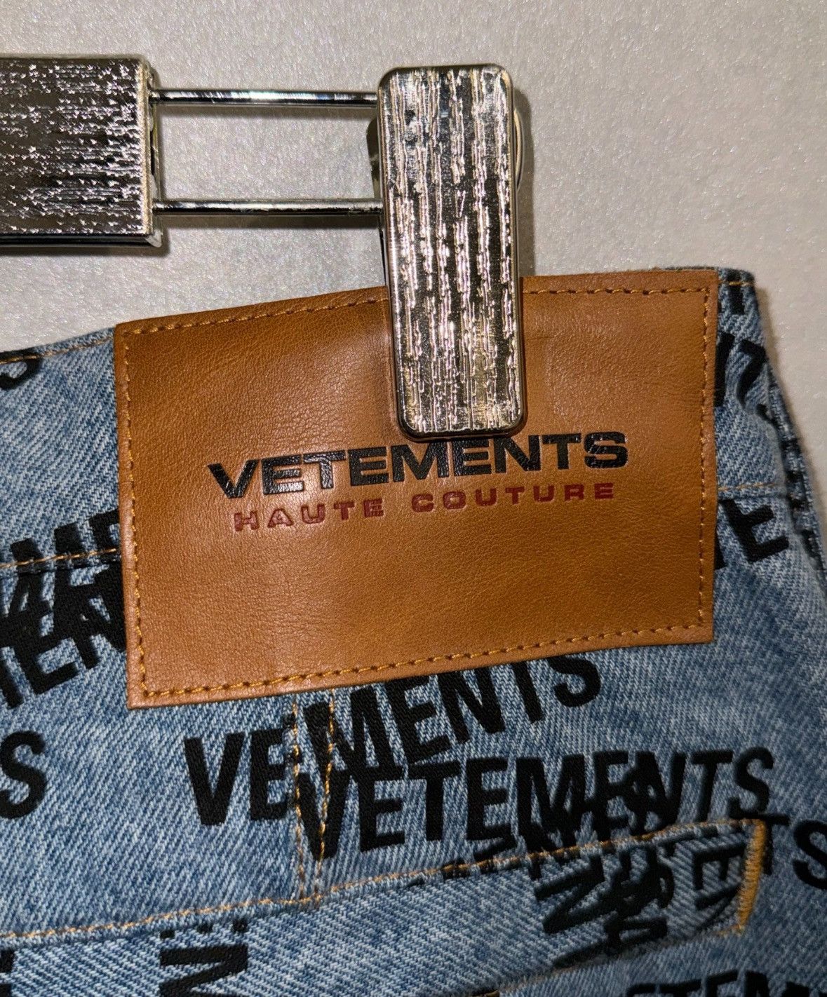 All over stamped logo transformer jeans