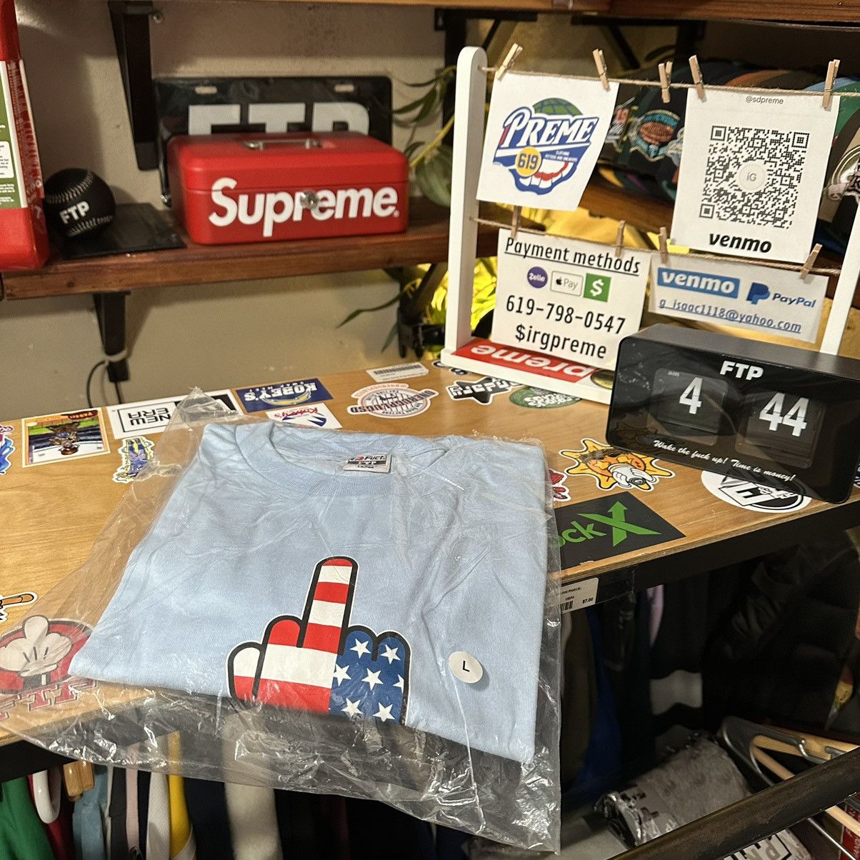 FUCT × Fuck The Population Ftp Fuct middle finger US flag tee(sky blue) L Size US L / EU 52-54 / 3 - 1 Thumbnail