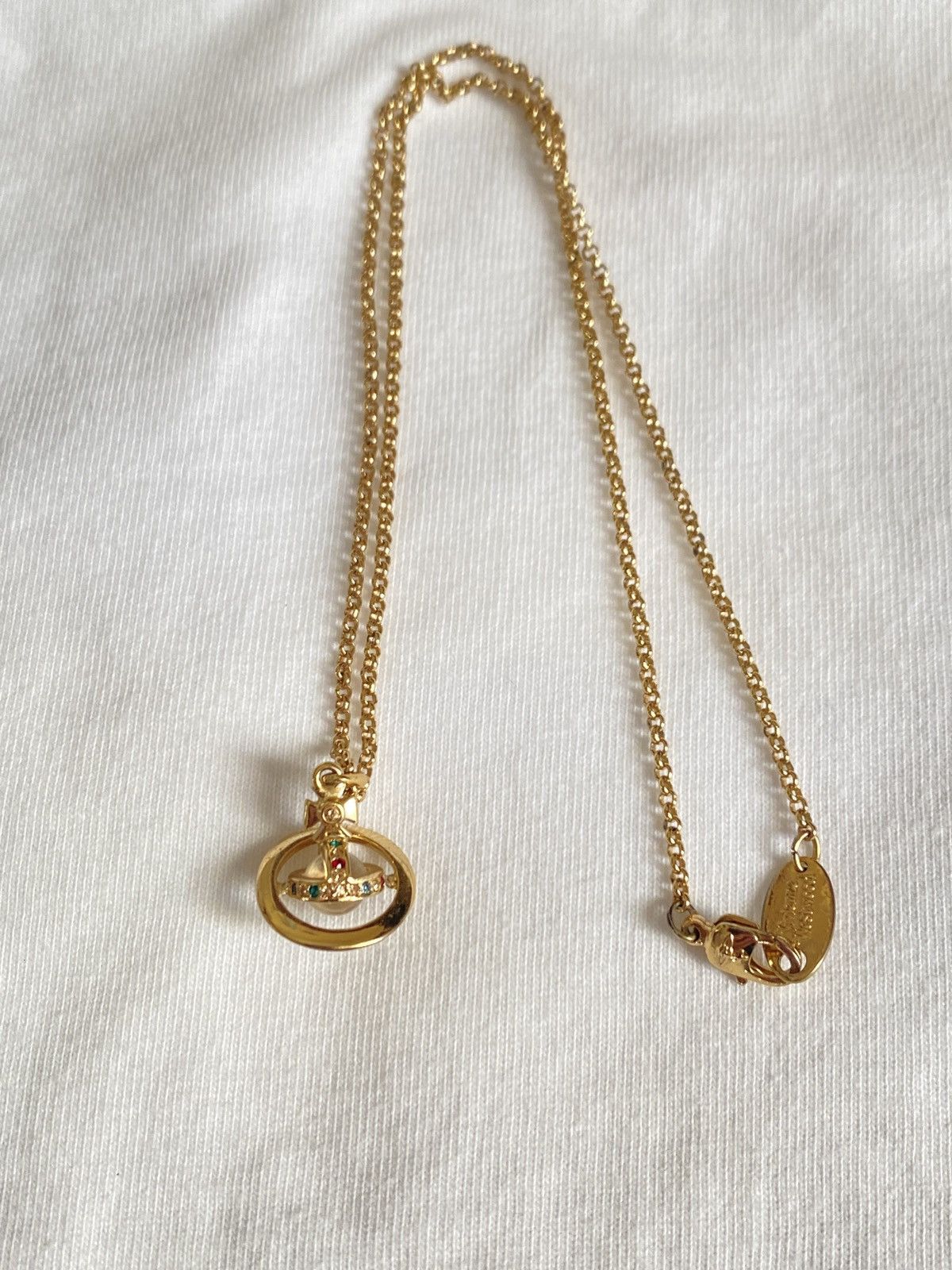 image of Vivienne Westwood Tilted Orb Necklaces in Gold, Men's
