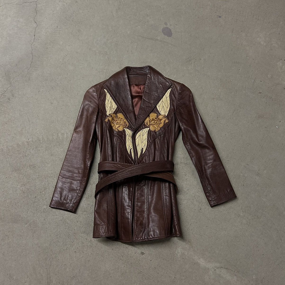 image of Archival Clothing x Avant Garde 1970's East West Musical Instruments Leather Coat Jacket in Brown, 