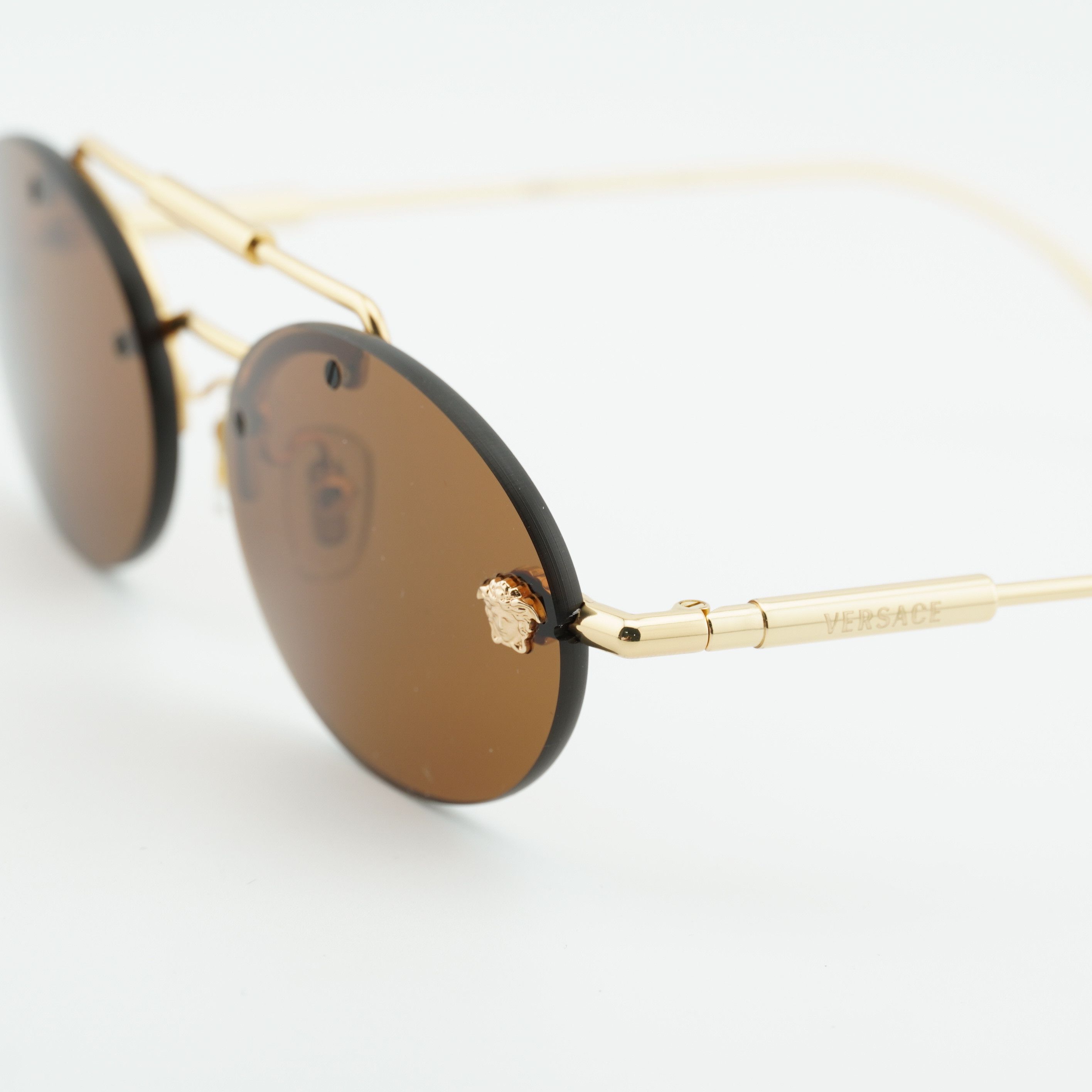 Versace Versace VE2295 1002/73 Sunglasses Gold Oval Frame Size ONE SIZE - 2 Thumbnail