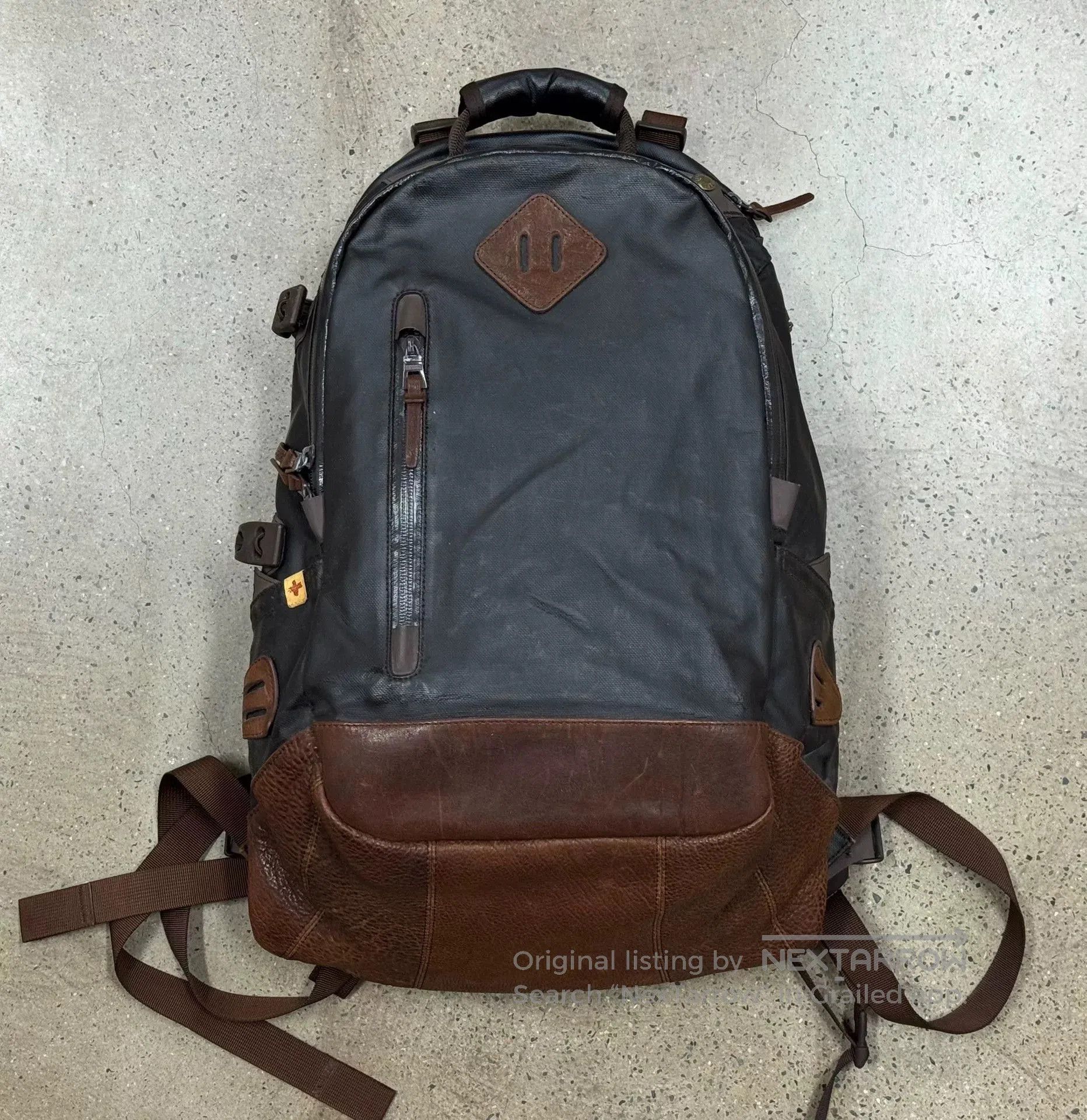 visvim lamina 20l coated backpack.