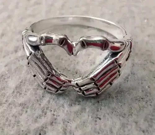 Ring Of Fire Skull Hand With Heart-Shaped Ring Size ONE SIZE - 1 Thumbnail