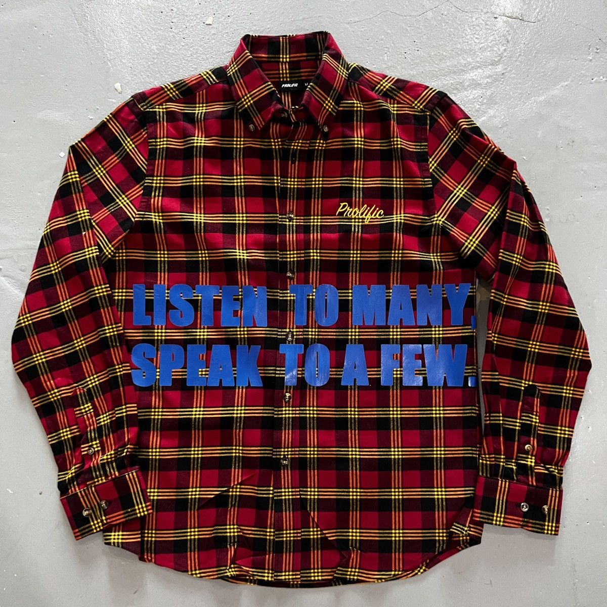 Listen To Many Speak To A Few flannel button down