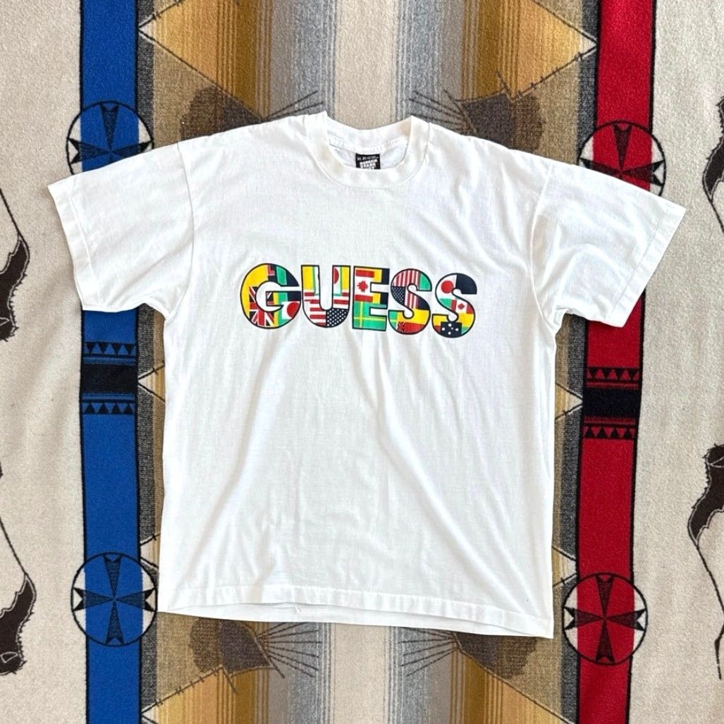 Vintage VINTAGE Guess Nations Flags T-Shirt Large Men 90s White Short Sleeve World Flags 1990s Size US L / EU 52-54 / 3 - 2 Thumbnail