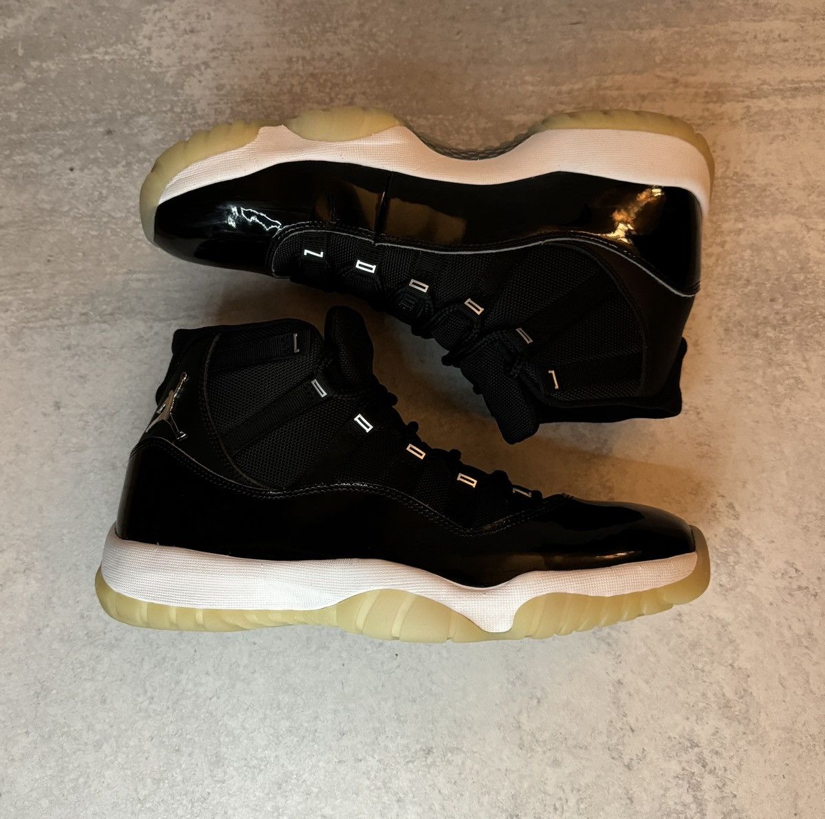 image of Jordan Nike Jordan 11 Retro Shoes in Black, Men's