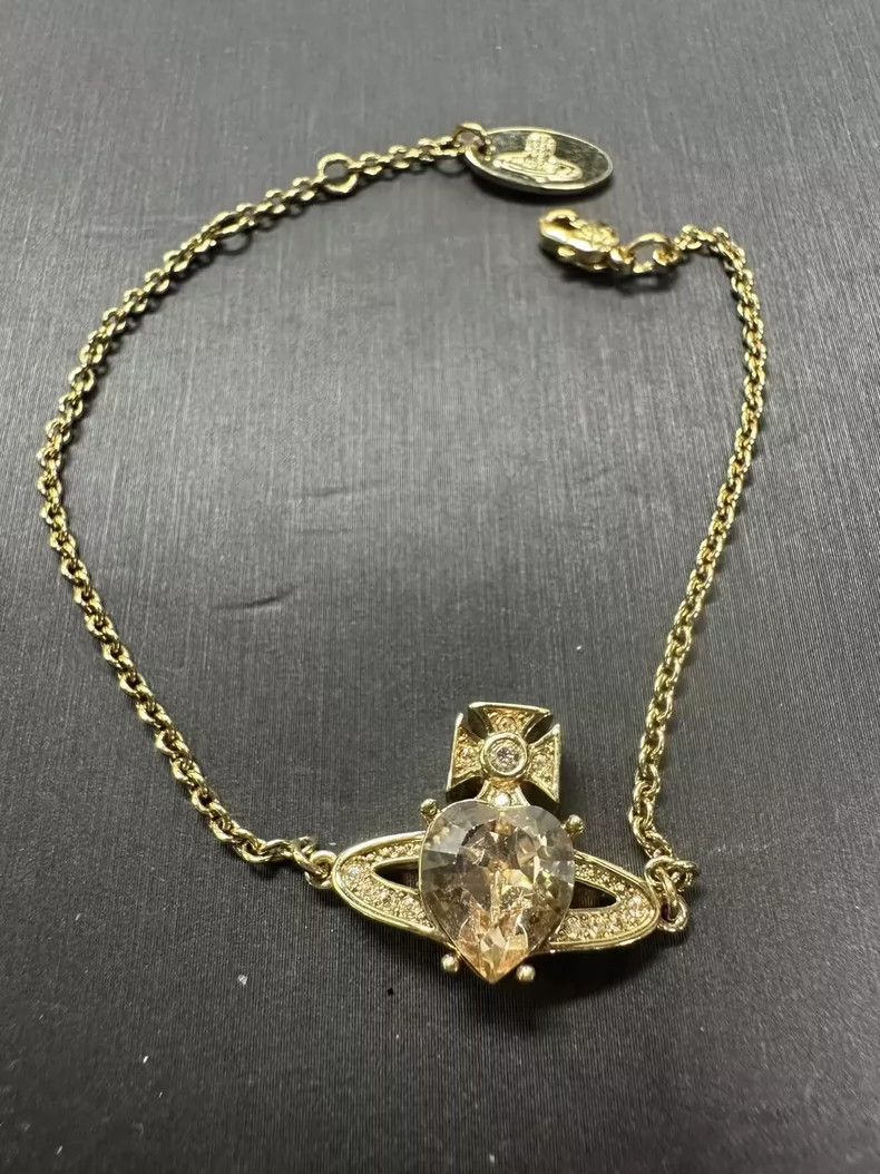 Vivienne Westwood Vivienne Westwood Gold Heart Saturn Bracelet - dmc Size ONE SIZE - 1 Thumbnail