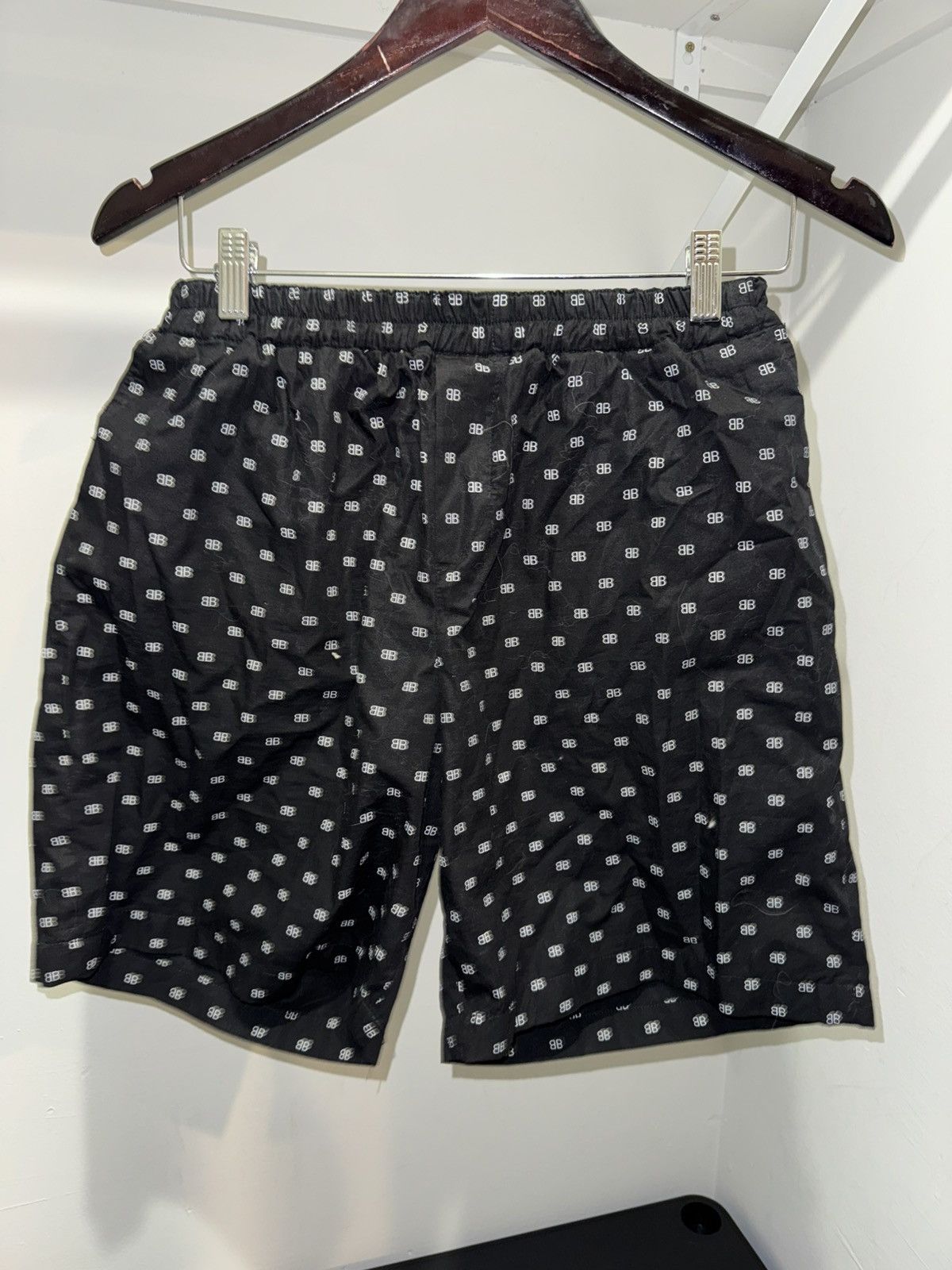 Balenciaga logo all over boxer style shorts in blacj