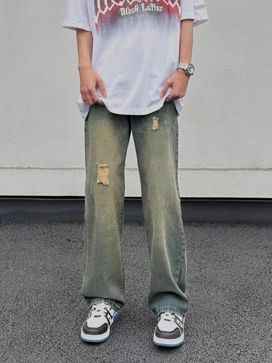 Vintage washed star embroidered ripped jeans