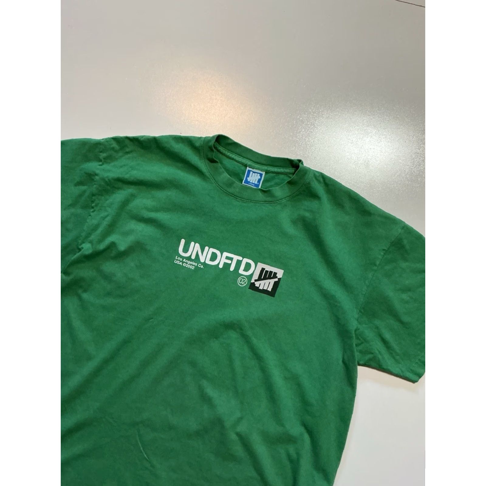 Undefeated VINTAGE Undefeated UNDFTD Los Angeles Five Strike Green Graphic 2002 S/S T-Shirt Sz. L Mens Shirt Green 2002 Five Strike UNDFTD LA SVG Size US L / EU 52-54 / 3 - 4 Thumbnail