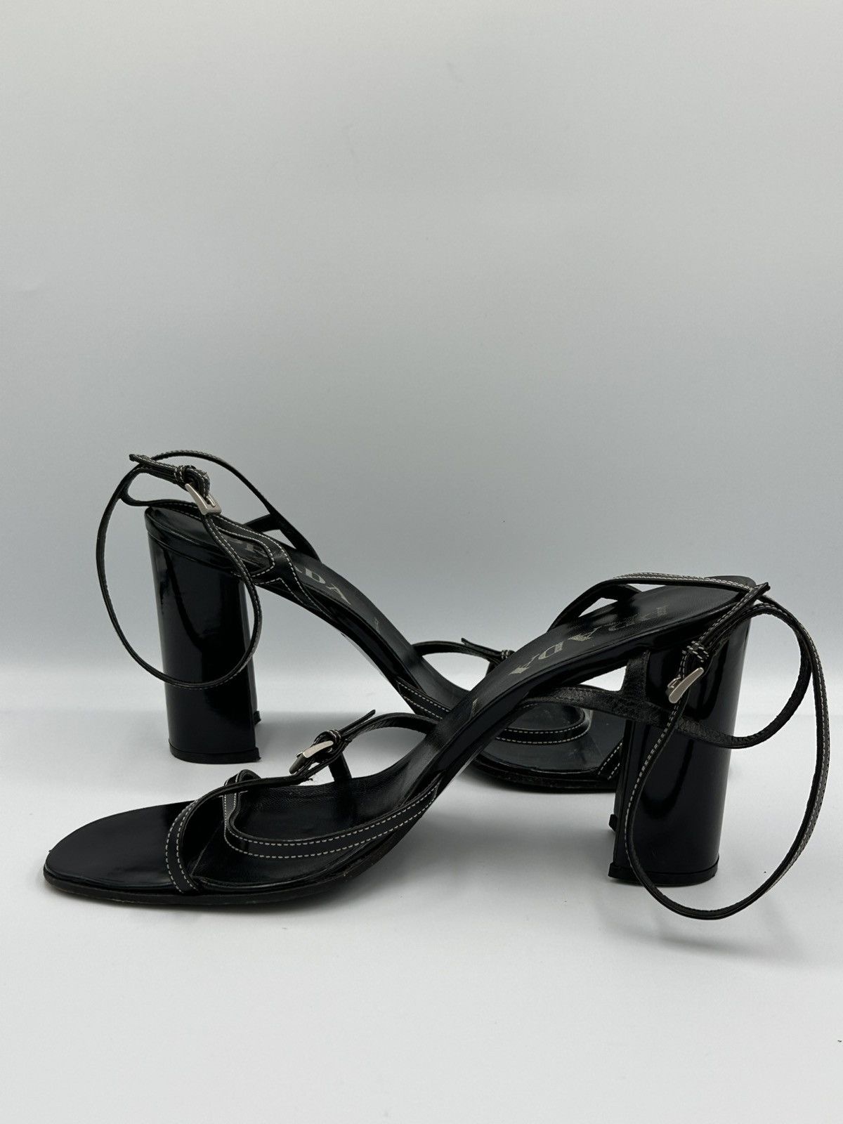 Prada heeled sandals crafted from black leather