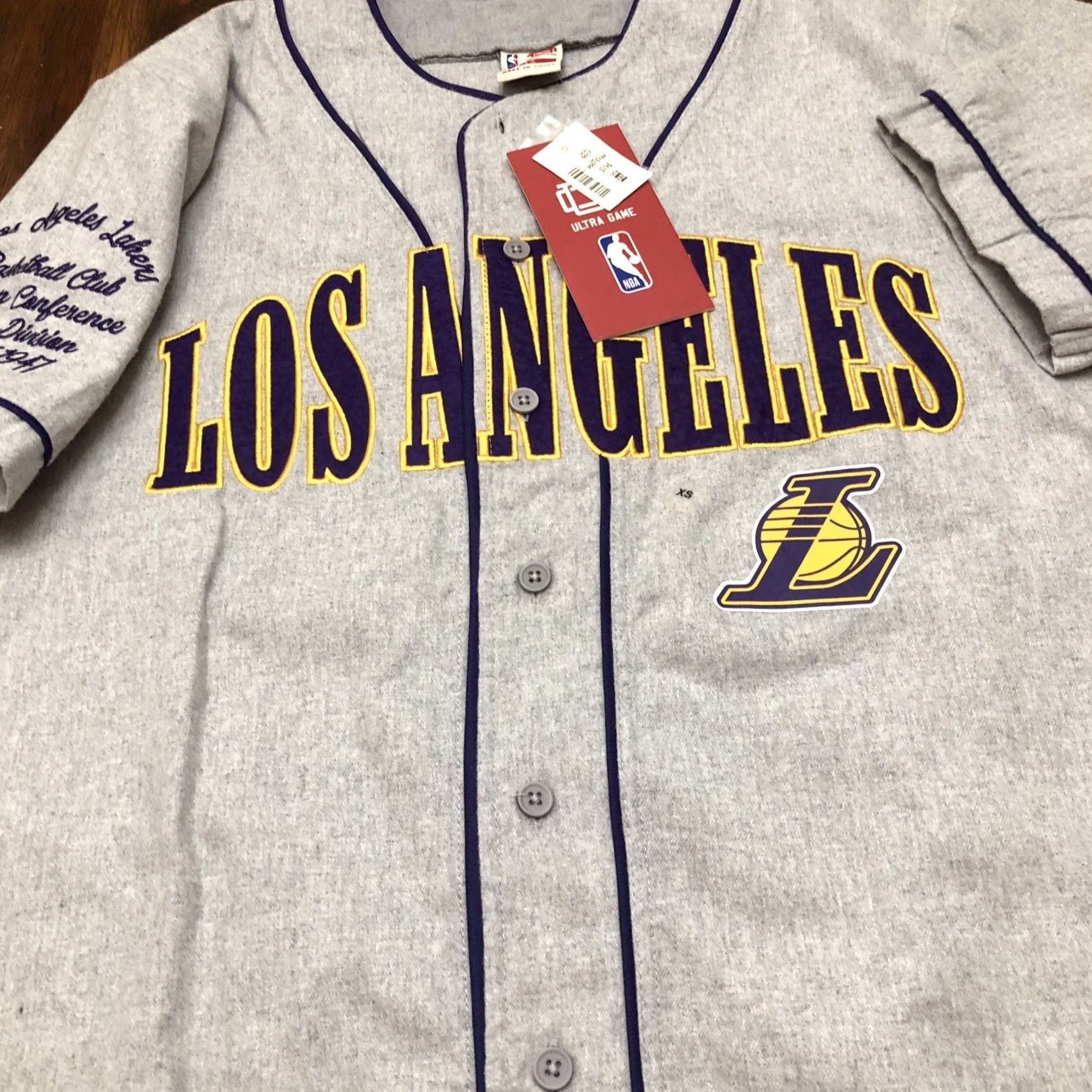 NBA NWT Ultra Game Los Angeles Lakers NBA Baseball Jersey XS Gray Mens size XS Baseball Jersey 41 in Chest 20.5" armpit to armpit 29 in length Size US XS / EU 42 / 0 - 7 Thumbnail