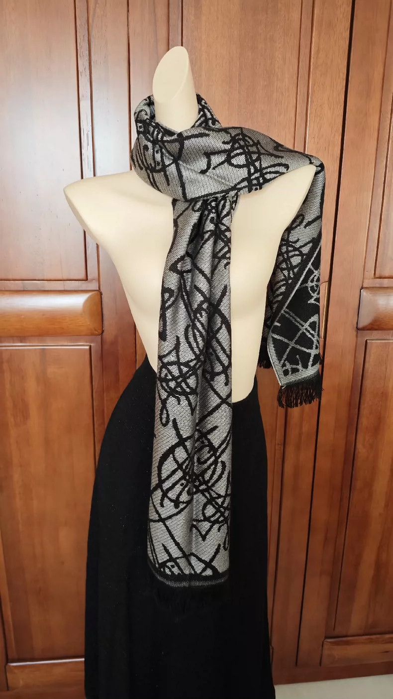 Vivienne Westwood Saturn graffiti double-sided tassel scar