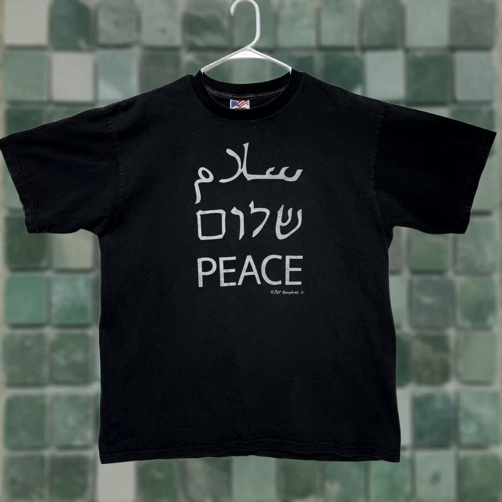 Vintage VINTAGE Jensen Activewear T-Shirt Mens XL Black 100% Cotton Short Sleeve Graphic Tee Peace USA 2001 Pat Humphries Indonesian? Size US XL / EU 56 / 4 - 1 Thumbnail