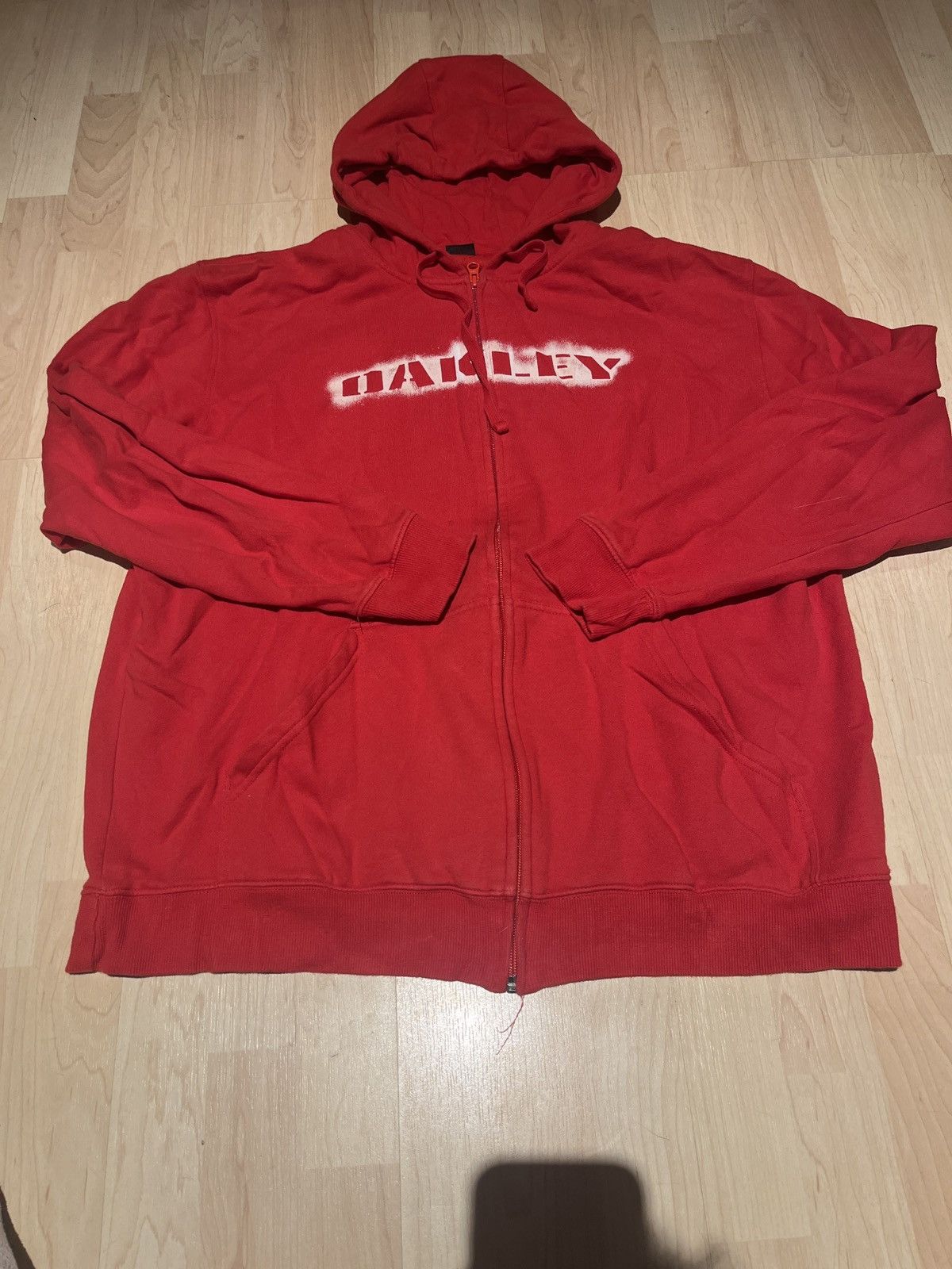 Oakley Oakley spray paint logo y2k zipup Grailed