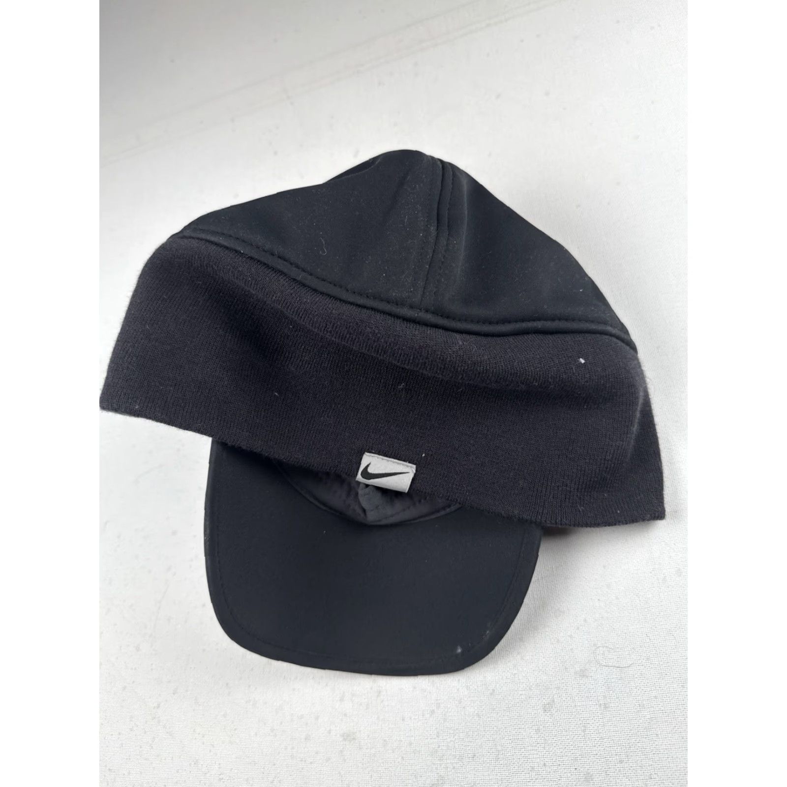 Nike Nike Golf Hat Therma-Fit Black Adjustable Microfiber Fleece Ear Flaps ProtectCap Men One Size Hat Size US M / EU 48-50 / 2 - 3 Thumbnail