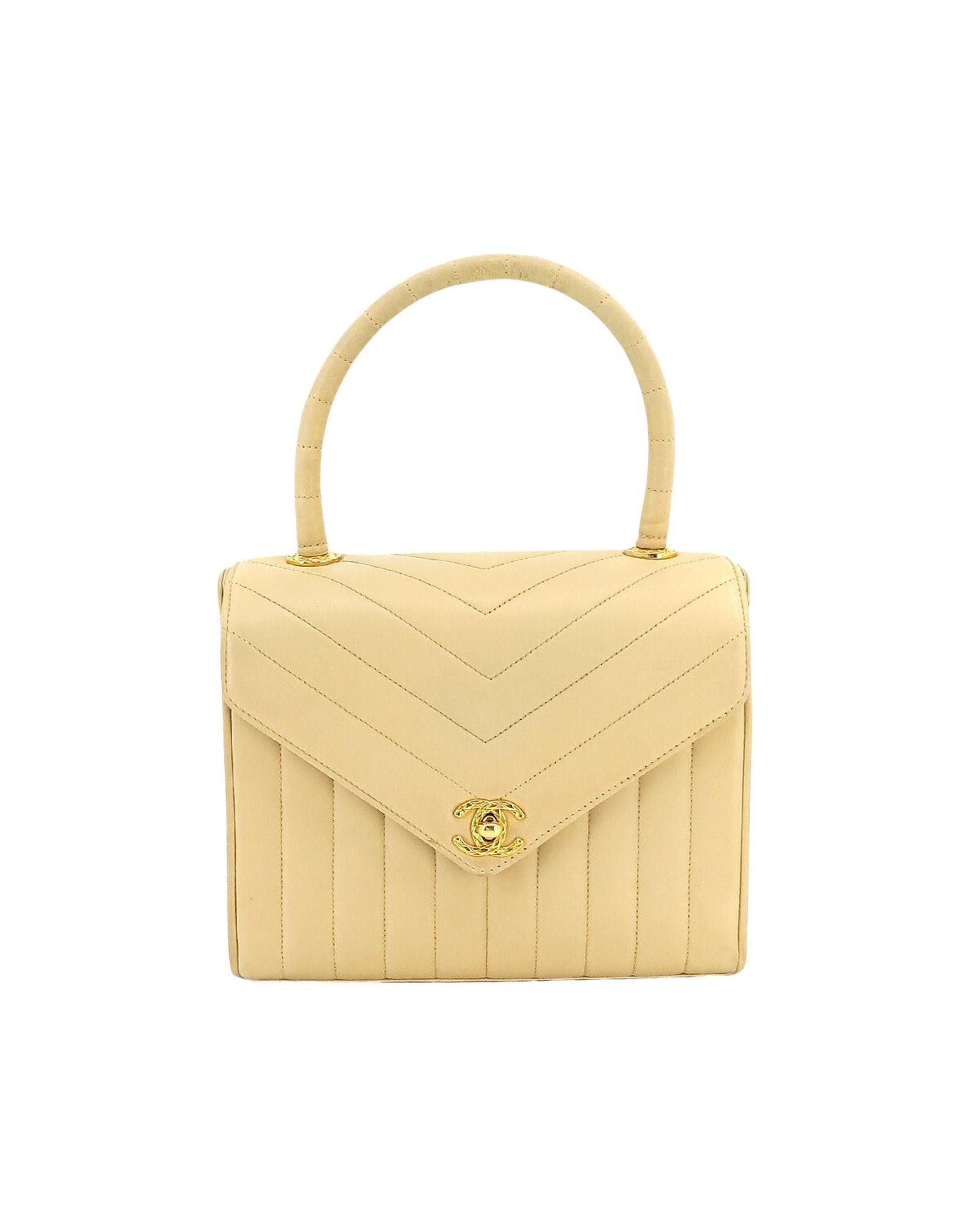 image of Chanel Elegant Beige Leather Handbag With Timeless Design And Impeccable Craftsmanship, Women's