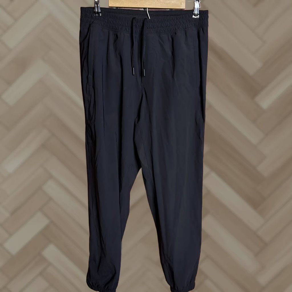 Lululemon Lululemon Jogger Pants Men L Black Nylon Mid Rise Tapered Leg Ankle Zip Size US 33 - 1 Thumbnail