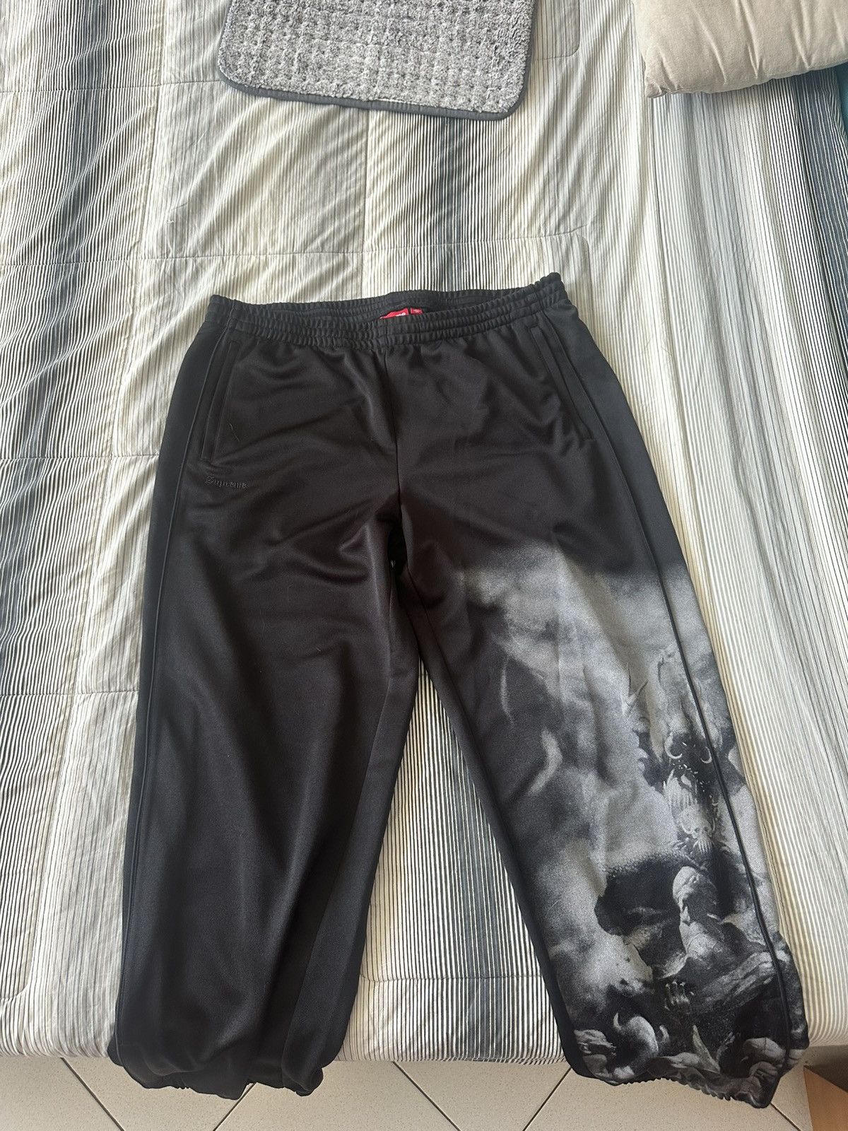 Supreme Supreme x Frazetta Track Pants in black, size XL. Size US 40 / EU 56 - 1 Thumbnail