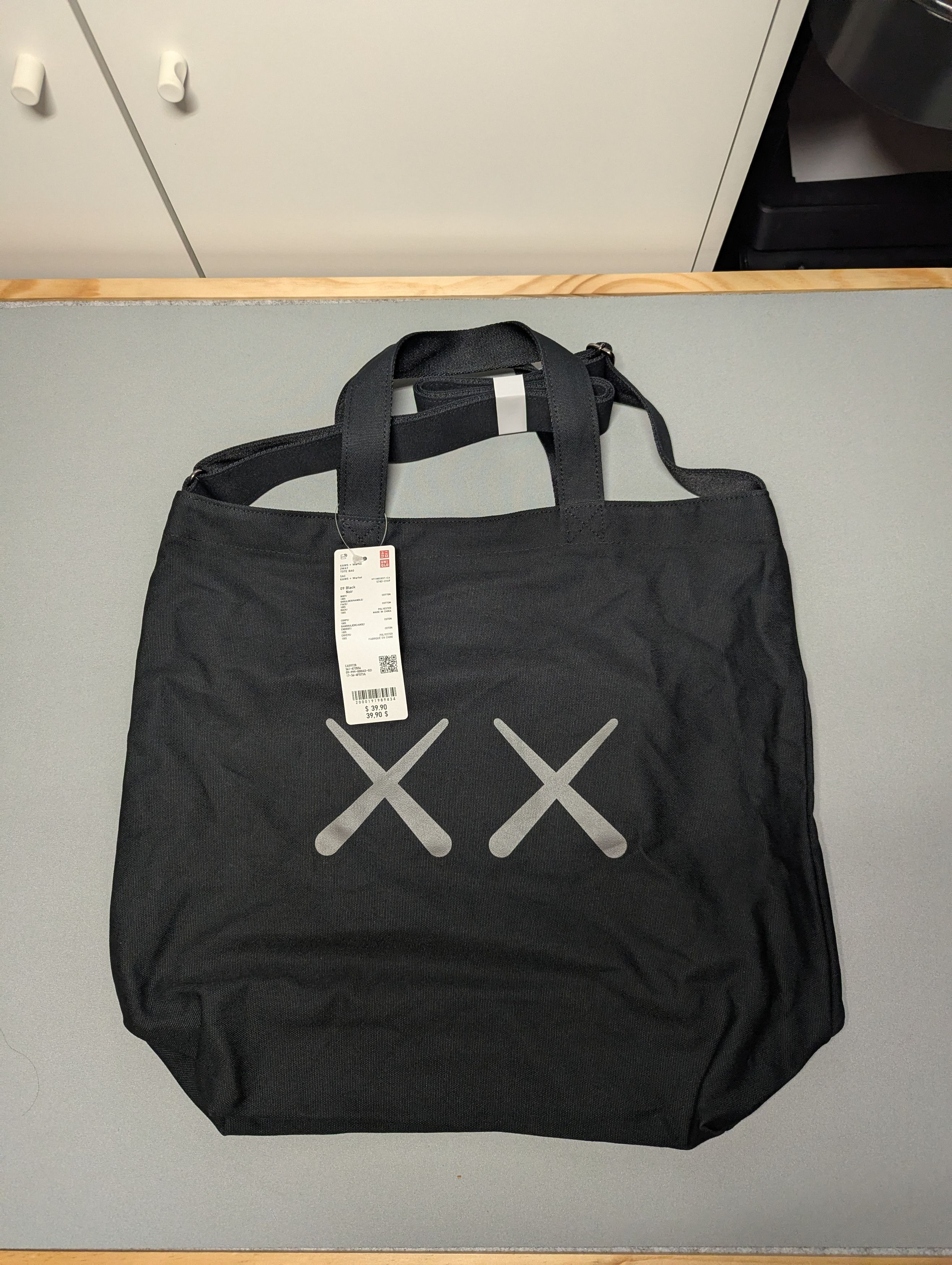 Andy Warhol × Kaws × Uniqlo BNWT RARE KAWS + WARHOL x UNIQLO 2WAY Newspaper Bag Black Size ONE SIZE - 1 Thumbnail