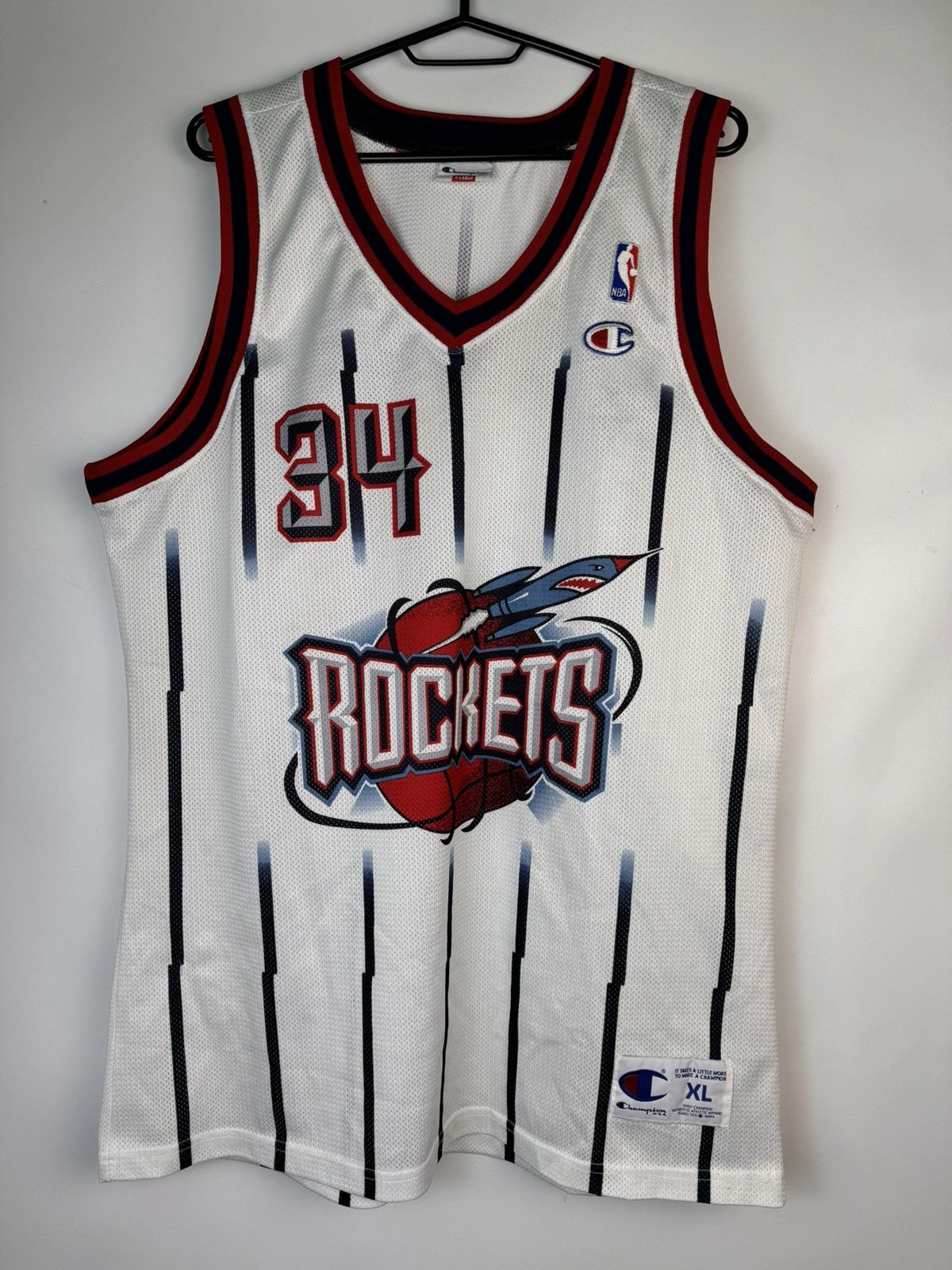 Champion × NBA × Vintage Hakeem Olajuwon Houston Rockets Champion Jersey White Rare Size US XL / EU 56 / 4 - 1 Thumbnail
