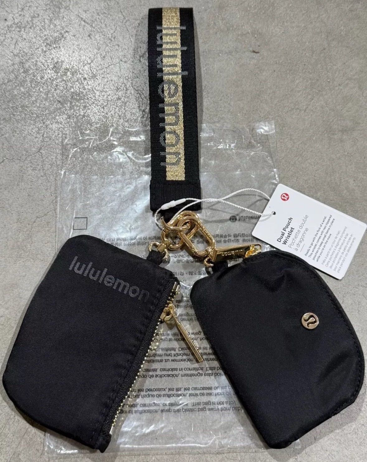 Lululemon Lululemon Black Dual Pouch Wristlet Wallet With Gold Accents Size ONE SIZE - 1 Thumbnail