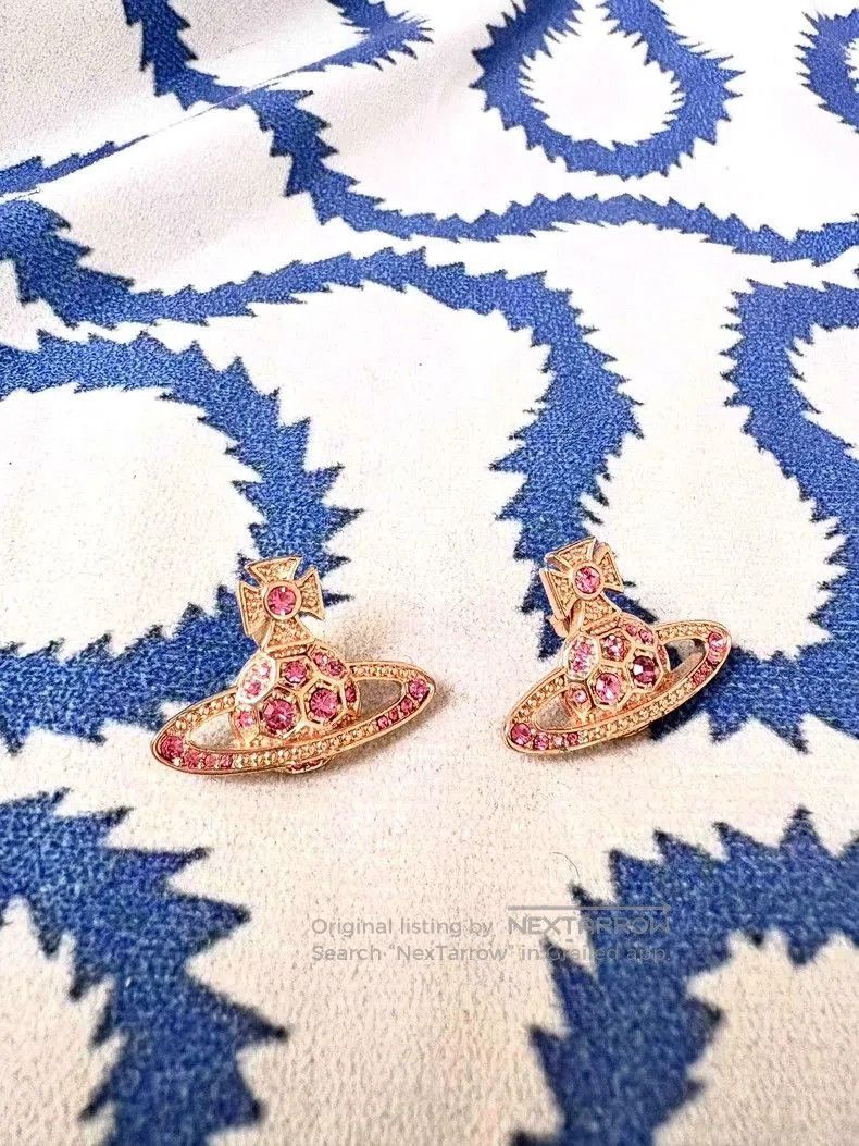 Vivienne Westwood Pink Gold Stud Earrings.