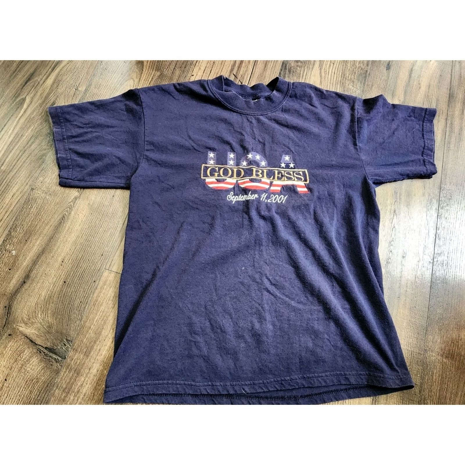 Gildan VINTAGE Gildan T-Shirt USA 9/11 Embroidered God Bless USA Twin Towers Crew Neck Short Sleeve Blue M Adult Mens Size US M / EU 48-50 / 2 - 6 Thumbnail