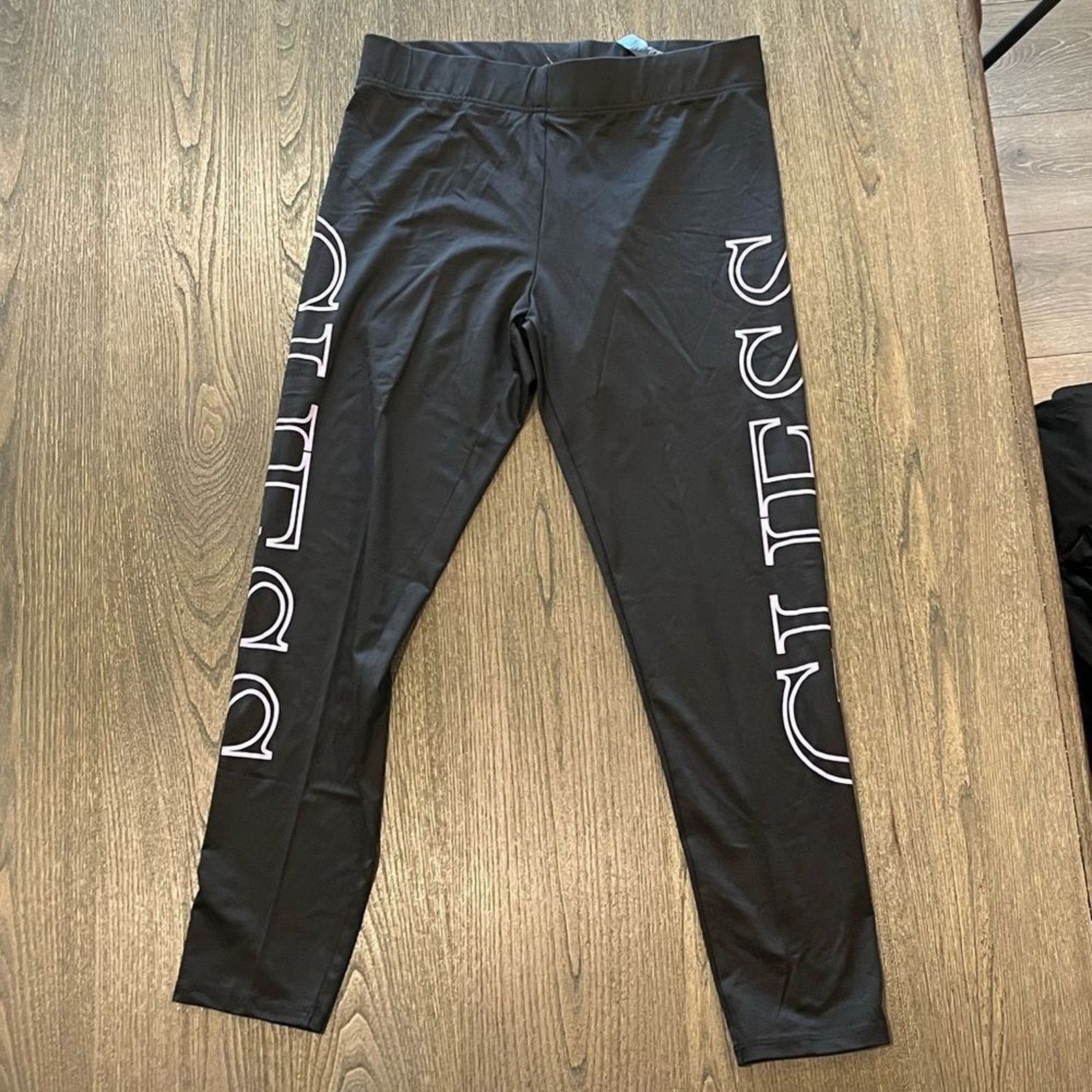 Guess NWOT Guess Black Cropped Capri Leggings Logo Print Size L Size 31" - 1 Thumbnail