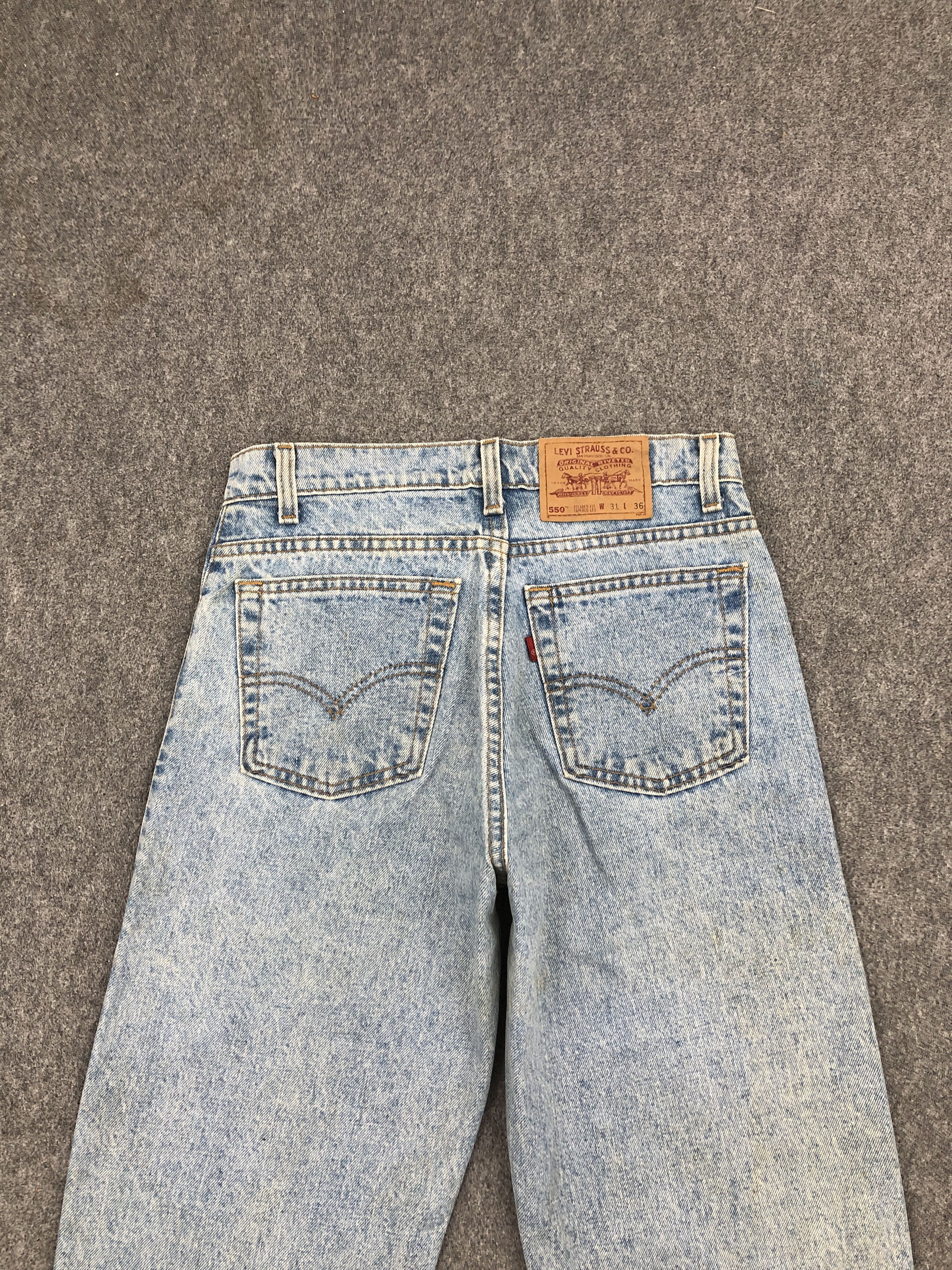 Distressed Vintage 90s Levi's 550 Light Washed Jeans