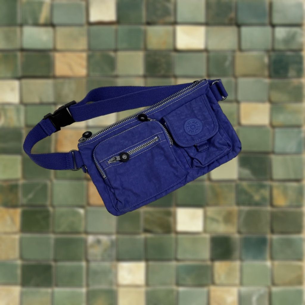 Vintage Kipling Blue Nylon Fanny Pack/Belt Bag Multi Pocket Travel Everyday Purse Crossbody Women's Medium Blue Nylon Bag Black/Gray Lining Pockets Size ONE SIZE - 1 Thumbnail