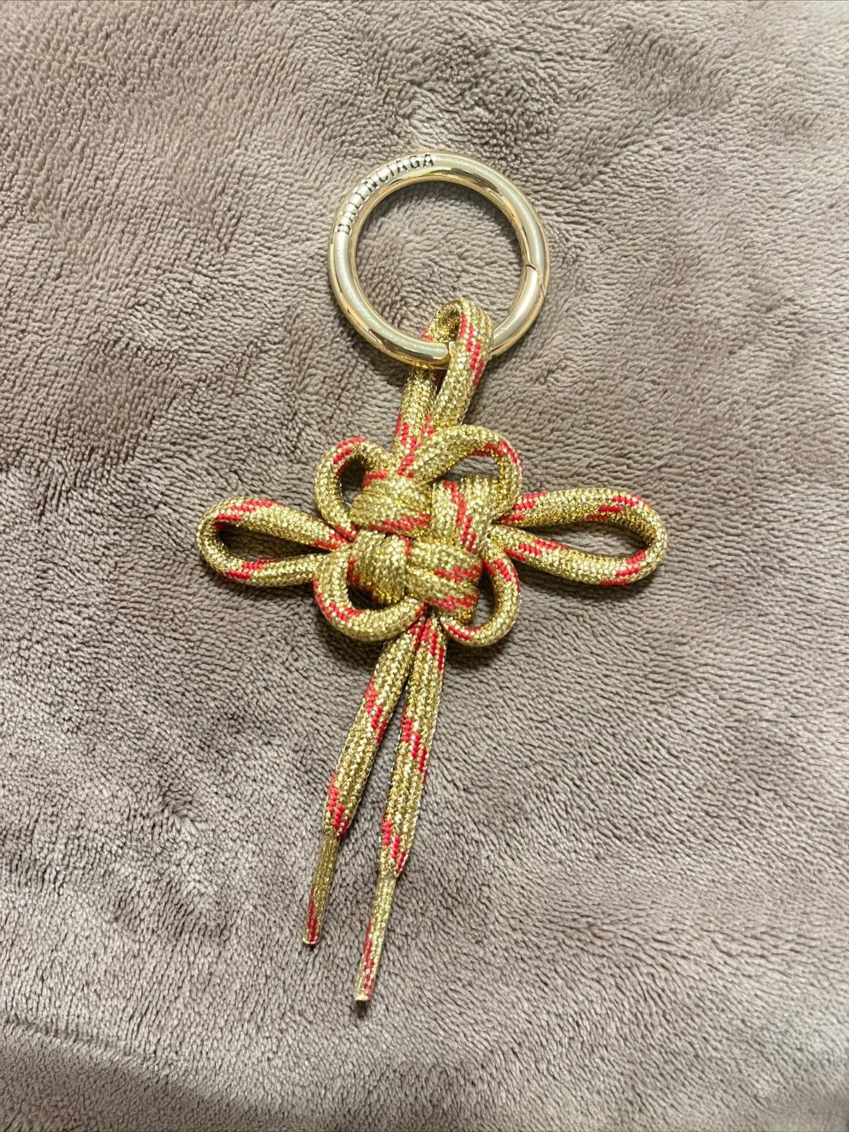 image of Balenciaga Chinese Knot Keychain in Gold, Men's