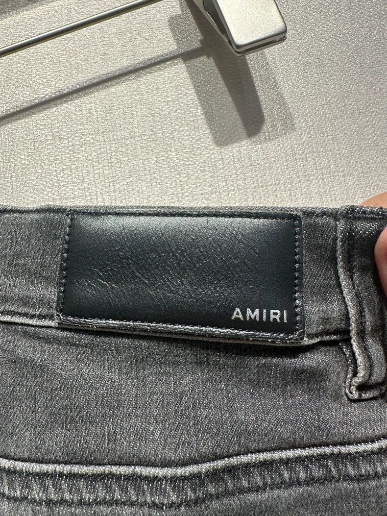 Amiri grey double knee hole spotted jeans