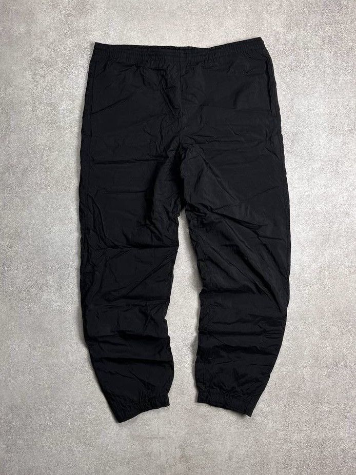 Vintage Vintage Nike Swoosh Baggy Nylon Trackpants Y2K M Size US 32 / EU 48 - 1 Thumbnail