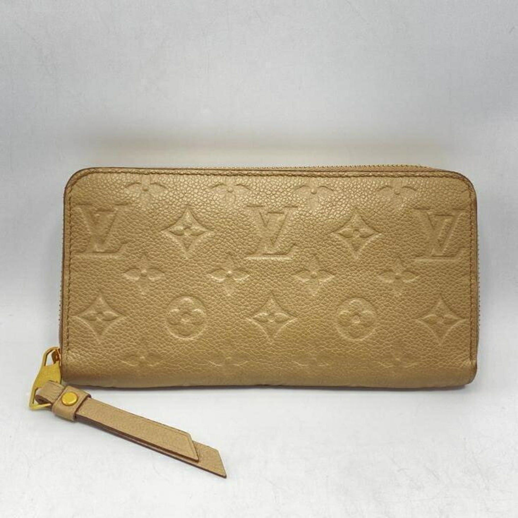 image of Louis Vuitton Zippy Wallet Long M69034 Beige Monogram Empreinte in Black, Women's