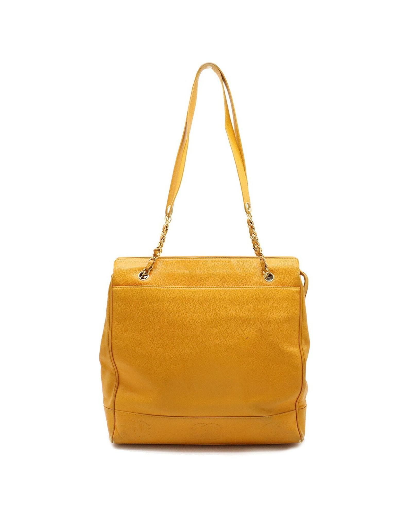 image of Chanel Versatile Caviar Leather Shoulder Tote Bag in Yellow, Women's
