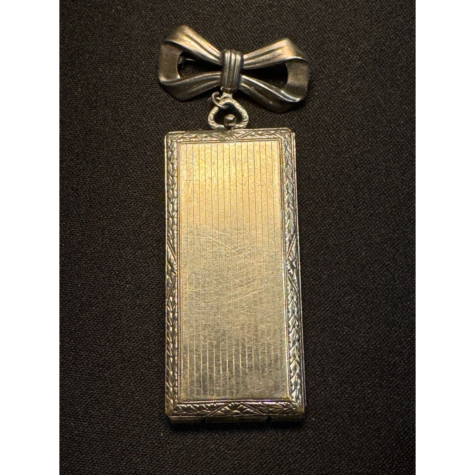 Other Antique Locket Bow Shaped Pin Silver Tone Opens Engraved JM Size ONE SIZE - 1 Thumbnail