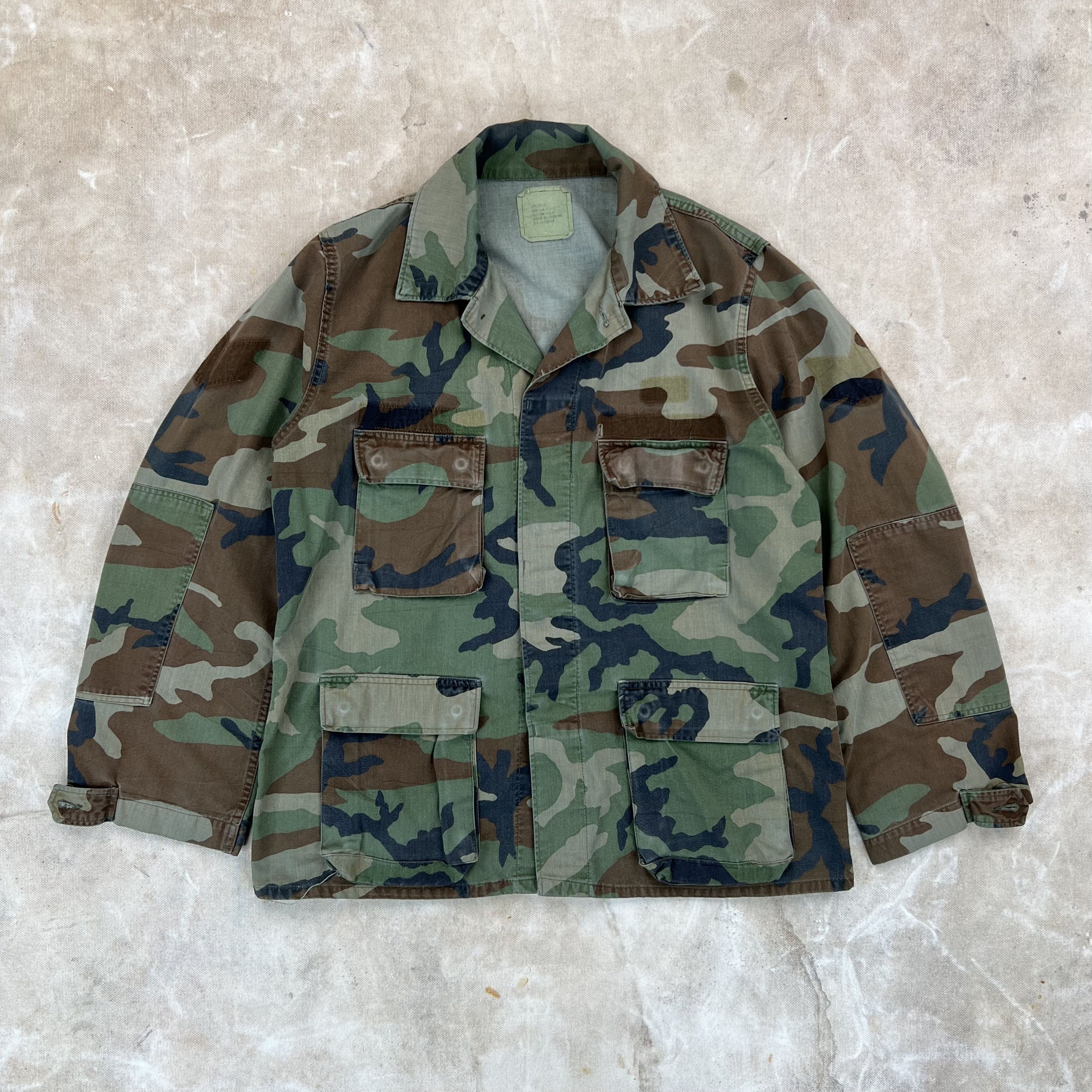 Vintage Vintage 1983 U.S. Military Woodland Camo Twill Combat Jacket