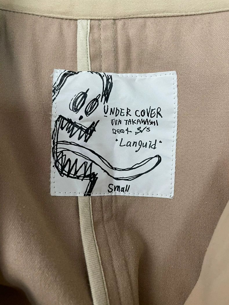 Undercover Undercover 2004 dissolution period Languid trench coat Size US M / EU 48-50 / 2 - 6 Thumbnail
