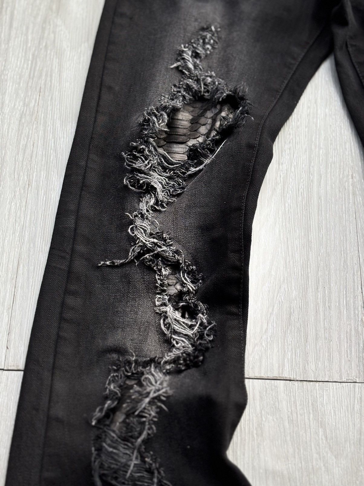 PARANOID extra long distressed flare jeans