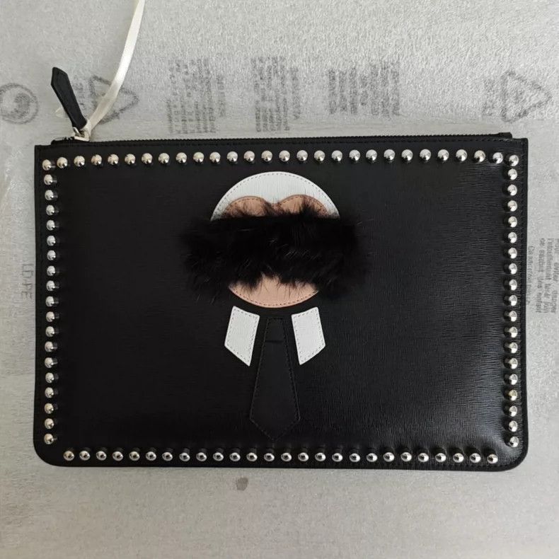 Fendi studded leather zipper clutch bag