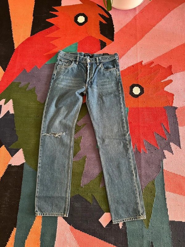 Balenciaga ripped knee jeans