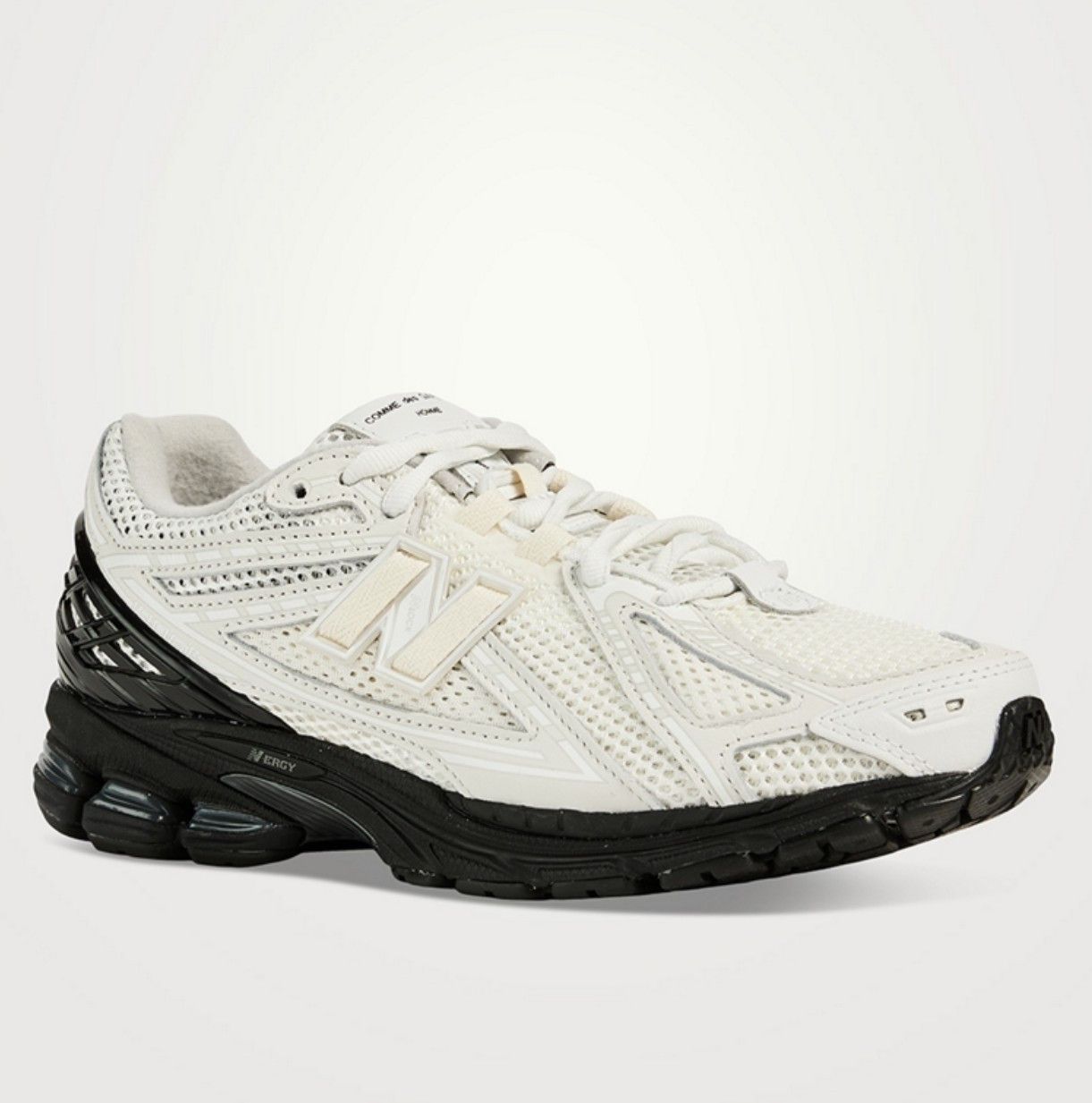 image of Comme Des Garcons Homme x New Balance Cdg Homme X New Balance 1906R Sneakers in Off White/Black (Si
