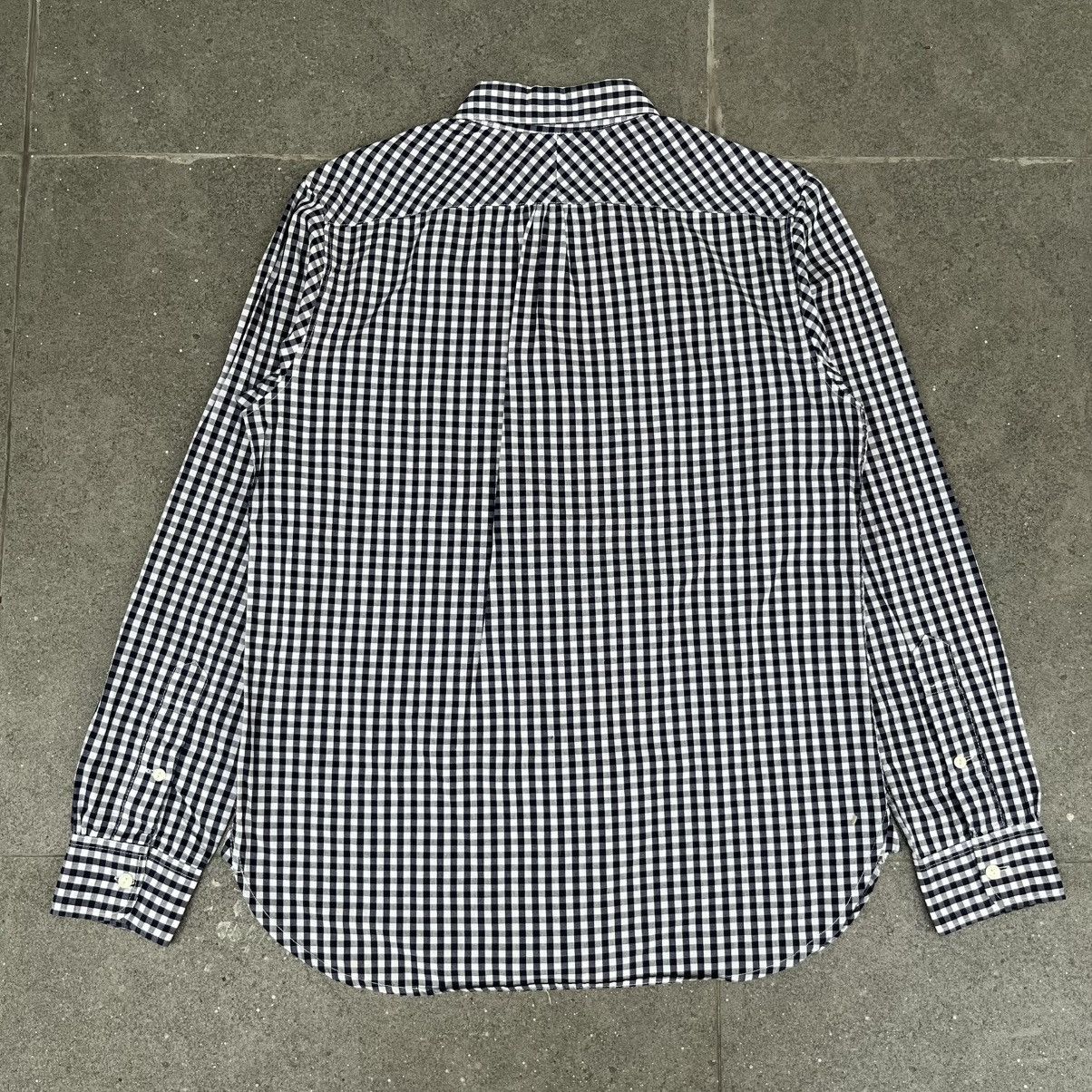 a blue garments plaid shirt button