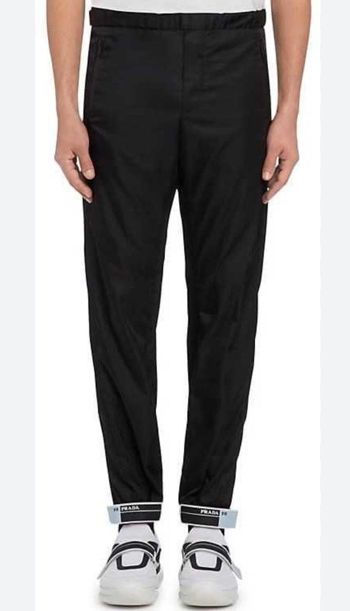 image of Prada Rubber Patch Logo Track Pants in Black, Men's (Size 30)