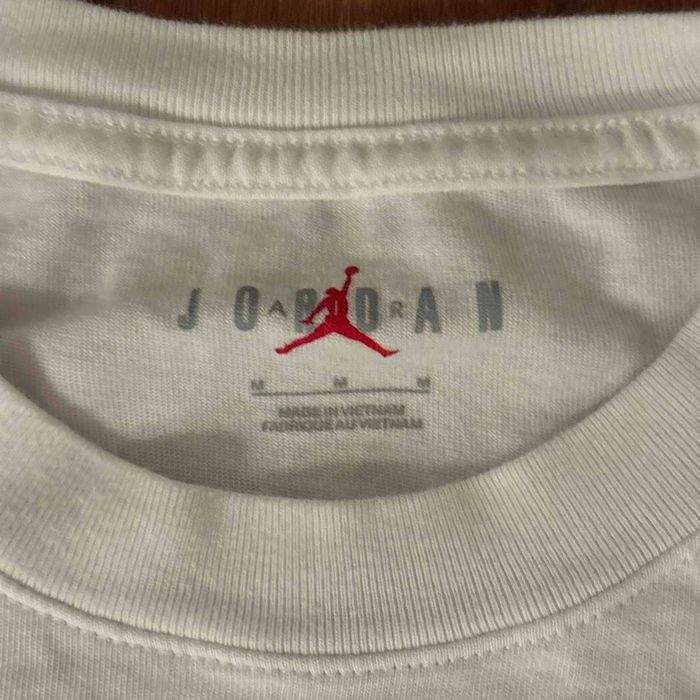 Jordan Brand × Undefeated Air Jordan x UNDEFEATED Strikes T-Shirt 'White' DX4304 100 Size US M / EU 48-50 / 2 - 6 Thumbnail